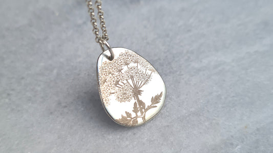 botanical pendant made from recycled silver